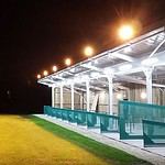 A picture of Sleight Valley Driving Range in the dark with floodlights lit up
